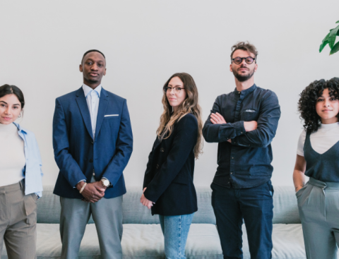 Business colleagues standing together for a group shot
