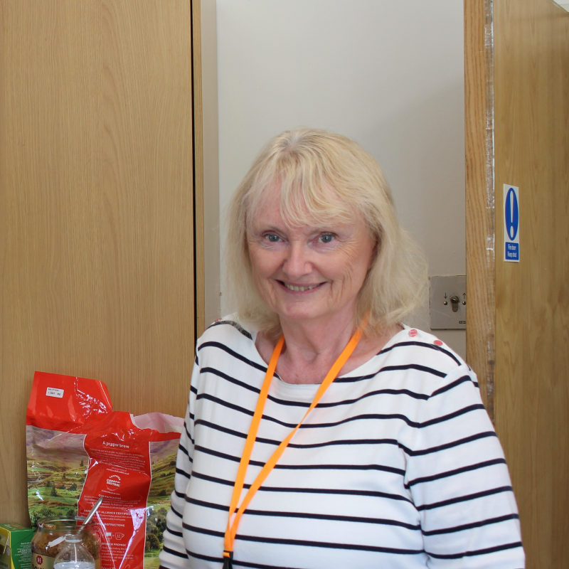Photograph of Patti at an Our Health Matters event