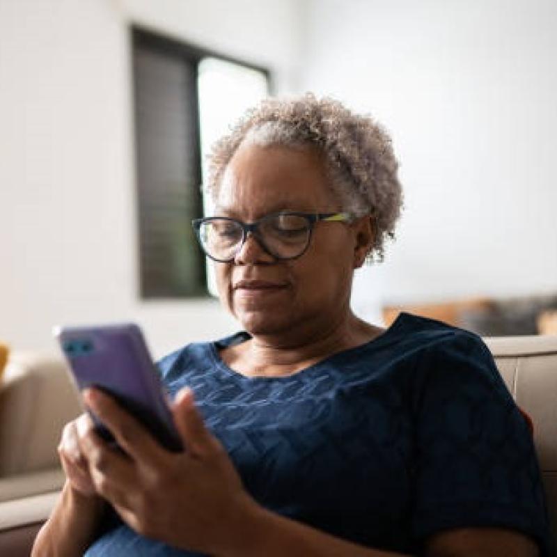 Elderly woman using a smartphone