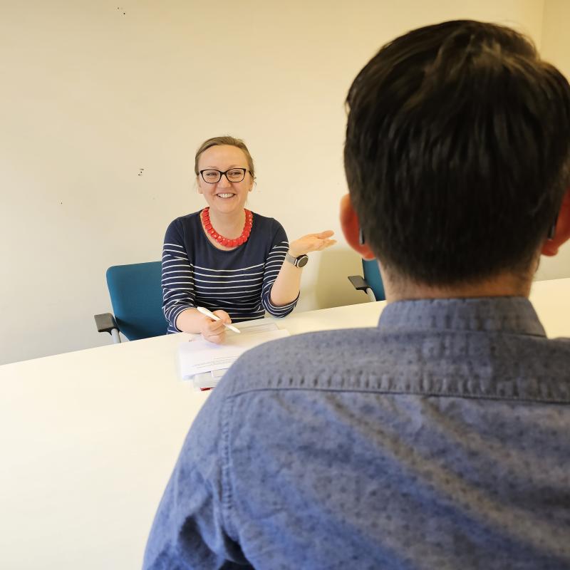 Two members of staff, Aneta and Tom, having a conversation.