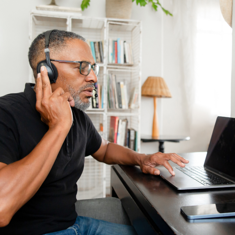 Man supporting an organisation to use their digital equipment
