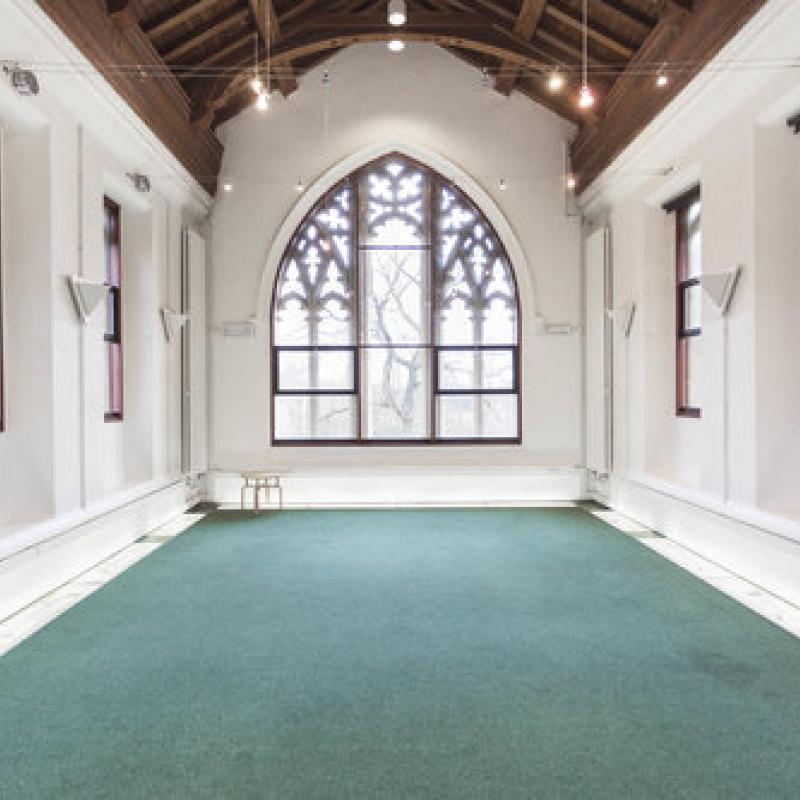 Spacious annex with large arched windows