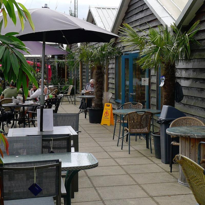 Outside seating area with plans and accessible paving to the entrance