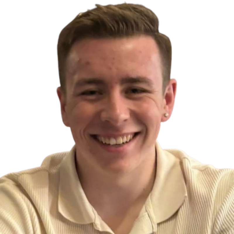Man smiling and wearing a polo shirt